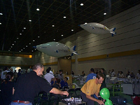 The Festo airfish circulate around the arena in the final countdown to the completion of the competition